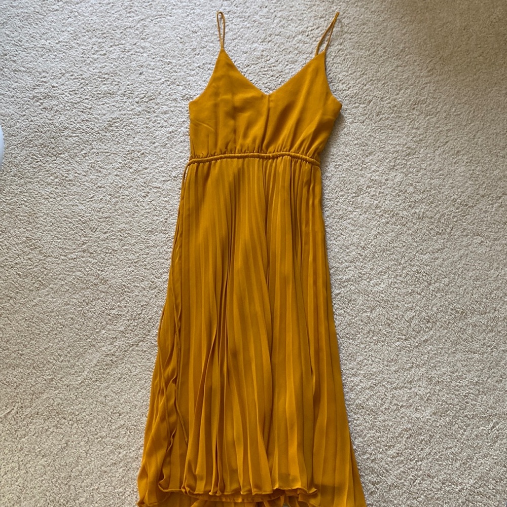 Yellow pleated midi dress